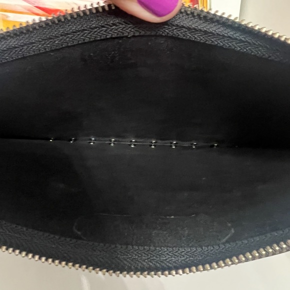 Rebecca Minkoff black clutch with silver studs.